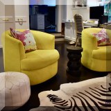 F20. Custom modern swivel chairs with Osborne and Little chenille fabric. 